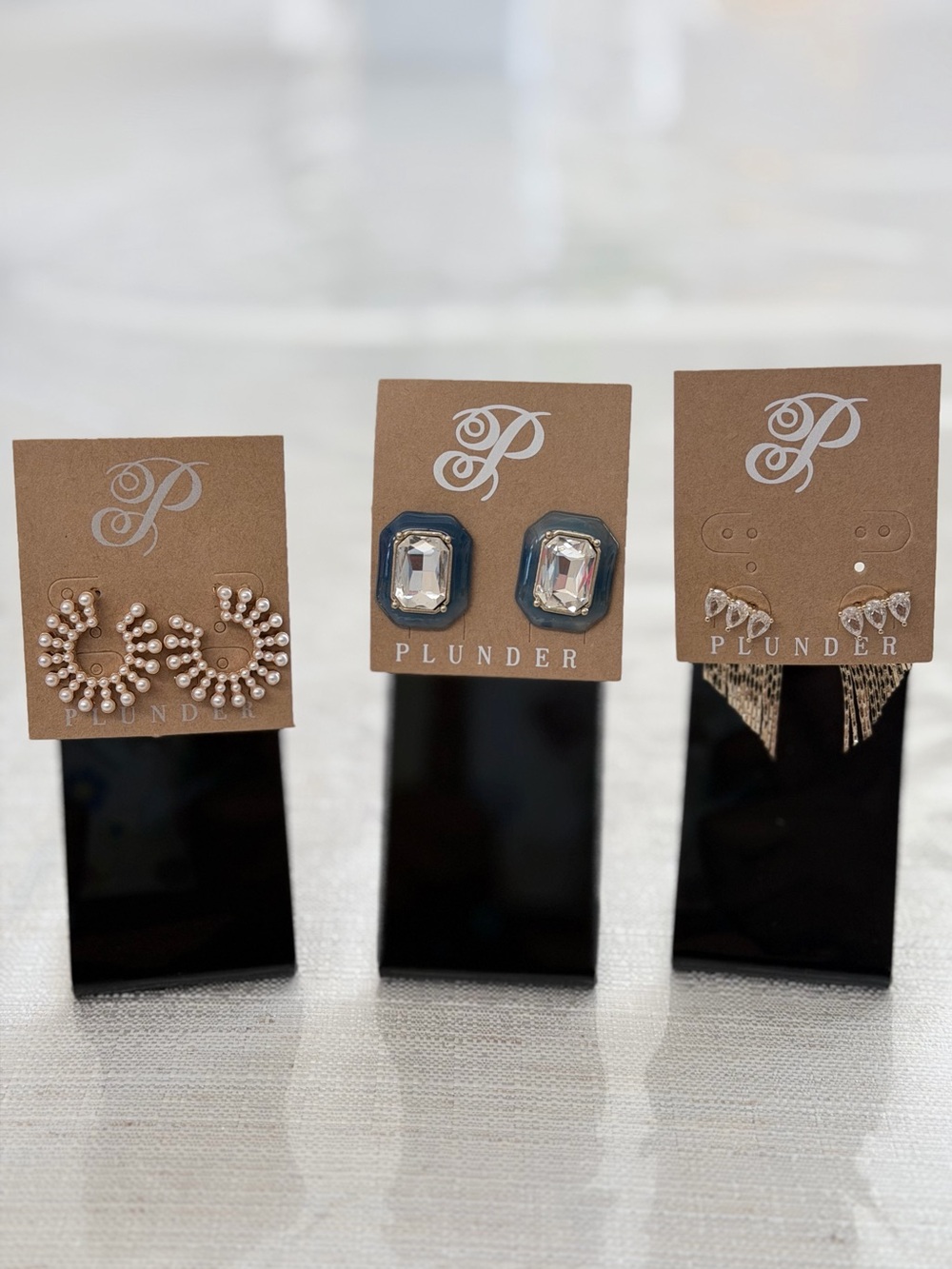 Pick one - plunder pearl hoops, rhinestone, gold fringe